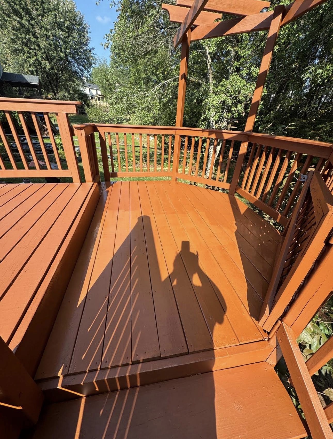 Freshly coated wood deck and railings
